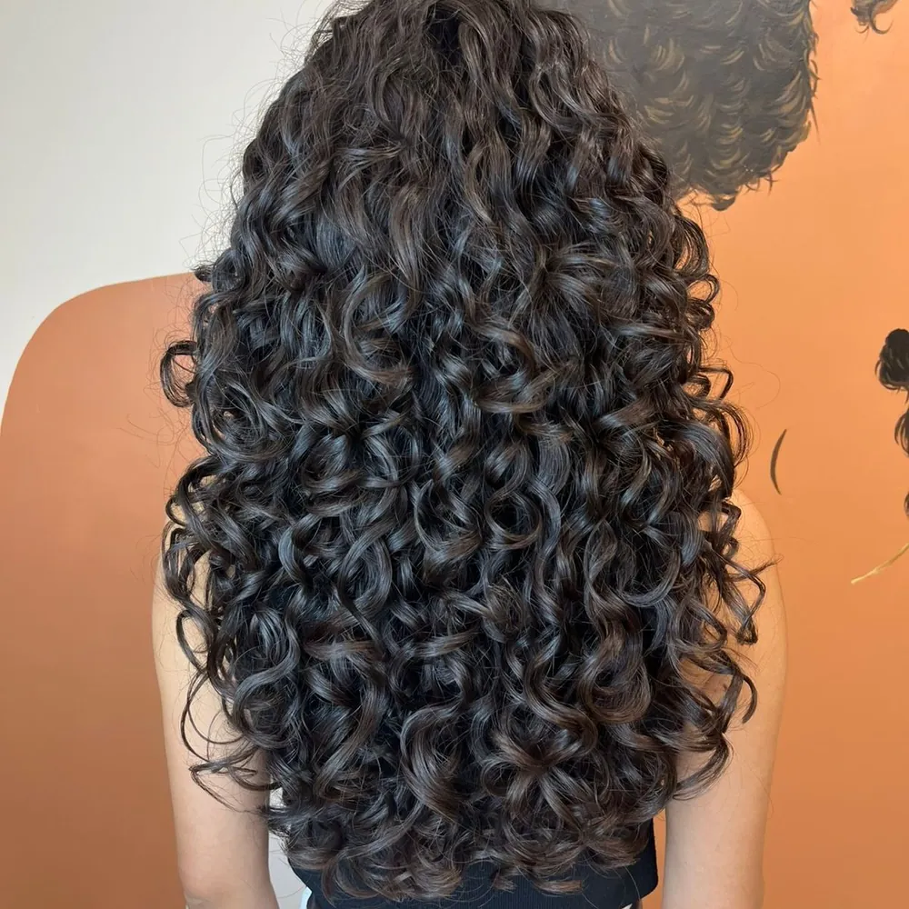 Resultado de un corte de rizos: definido y con volumen